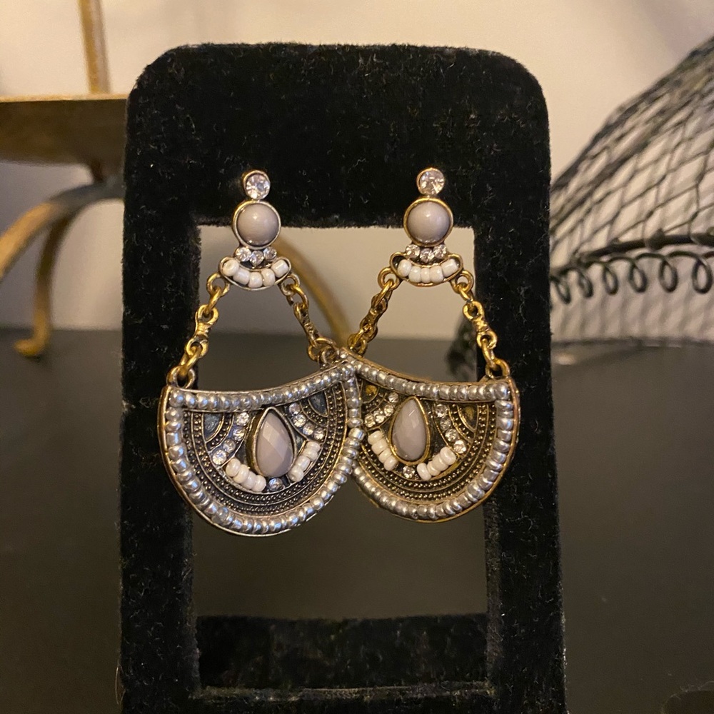 Light gray earrings with fine beautiful details